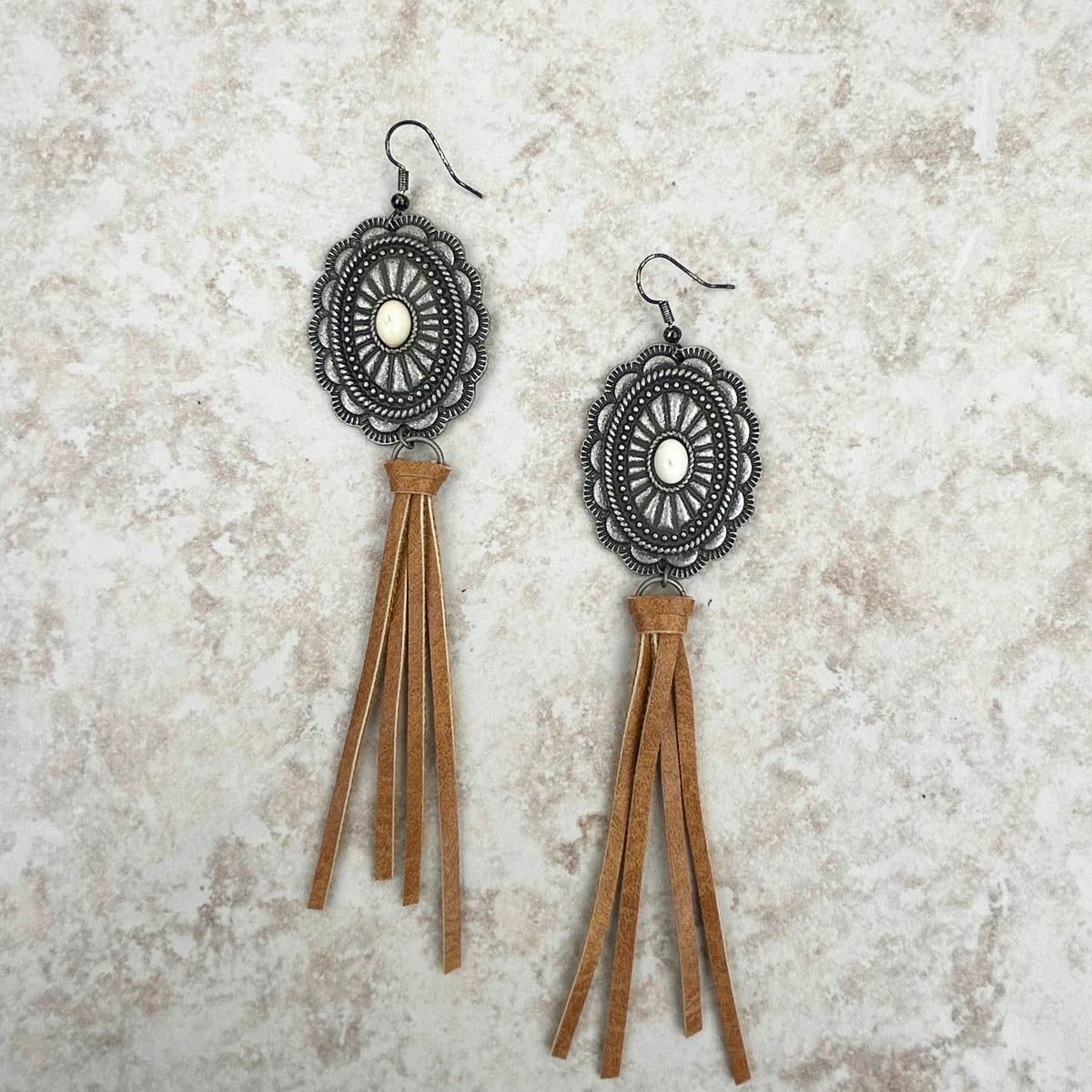 Silver with white stone concho dark brown tassel Earrings