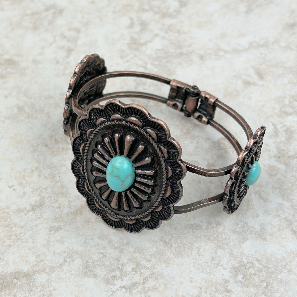 Three cooper concho with blue turquoise stone Bracelet